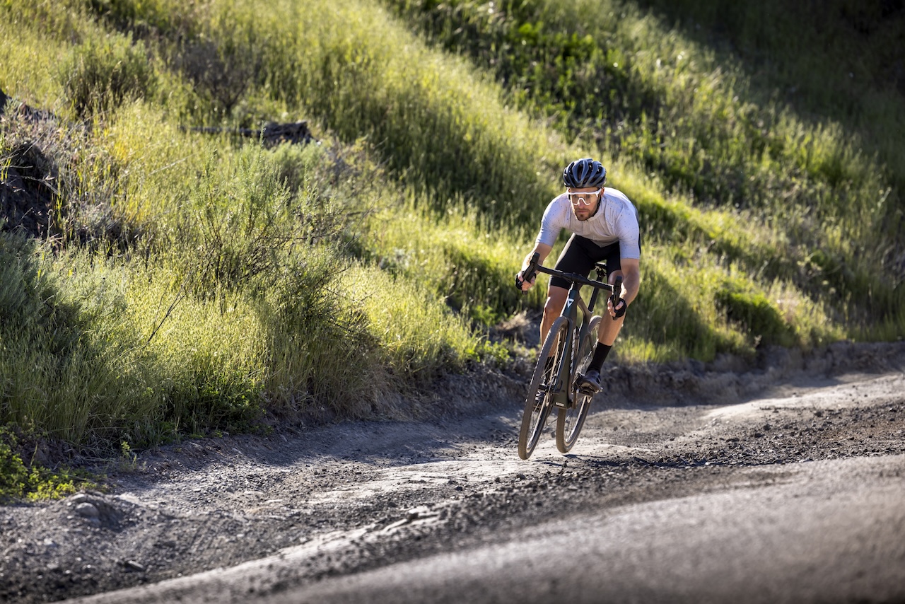 The transformative power of professional bike fitting Man cycling in the summer after a professional bike fitting